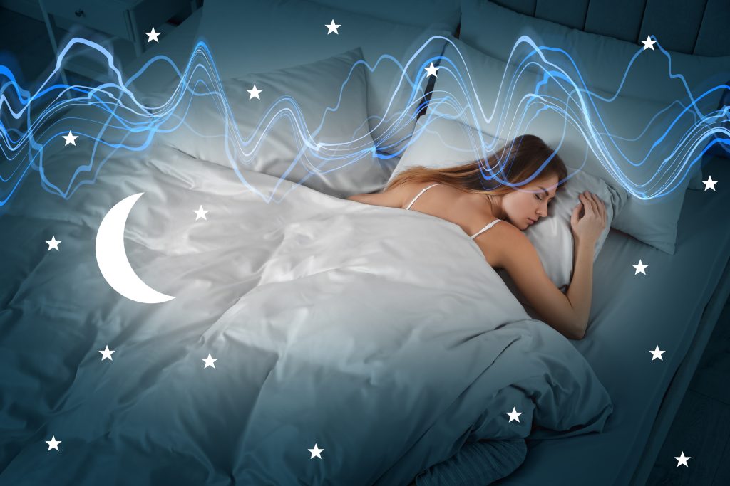 vrouw slaapt in bed 's nachts met emv straling