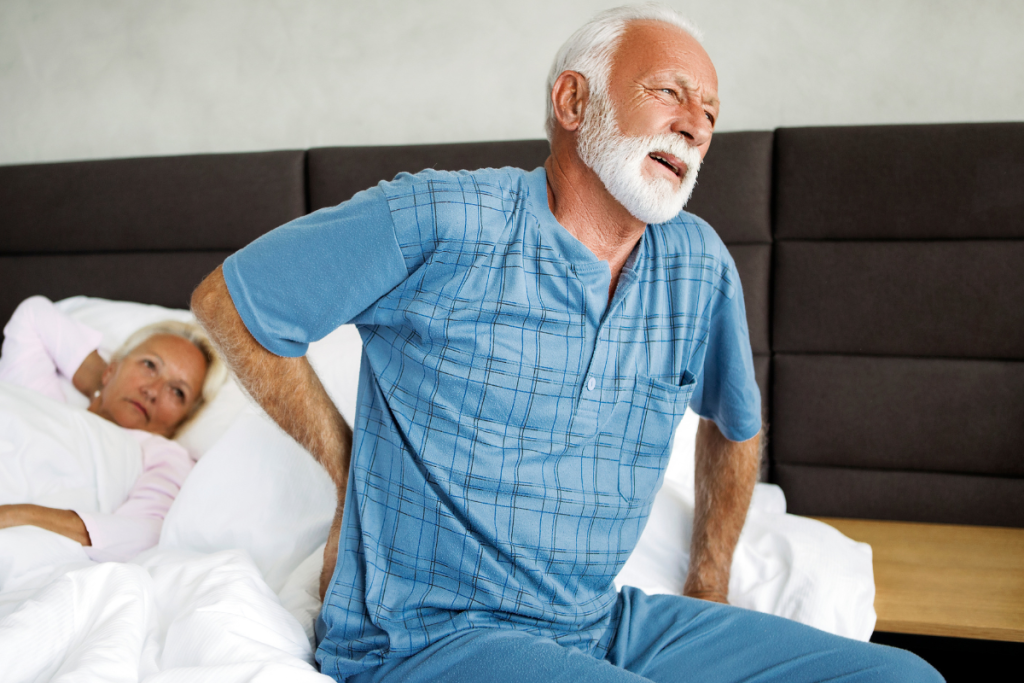 man suffers from hip pain after sleeping