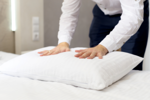 woman is pressing on firm piillow