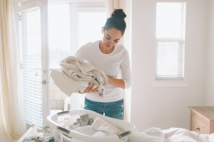 woman is washing a duvet